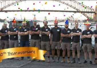 Bear Plumbing employees standing with arms crossed